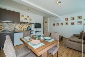 Posedenie v ubytovaní Gemini Apartments Siófok I., III.