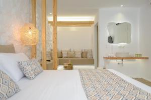 Postel nebo postele na pokoji v ubytování Naxian Spirit Inn