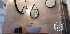 Koupelna v ubytování Le Cabanon du Pas du Loup - Studio climatisé RDC - proche mer + 31 fotografií