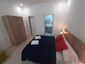 Posteľ alebo postele v izbe v ubytovaní MÁLAGA VELARDE cENTER