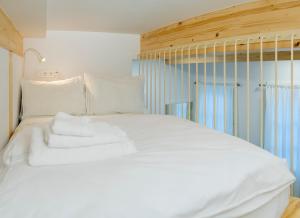 A bed or beds in a room at SanTelmo27A