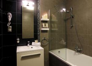 Kúpeľňa v ubytovaní Hotel Villa Völgy Wellness & Konferencia