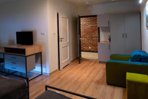 Telewizja i/lub zestaw kina domowego w obiekcie Hotel Spichlerz Pierwszy SPA & WELLNESS