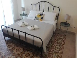 Posteľ alebo postele v izbe v ubytovaní "RUNFULÌA" Deluxe apartment