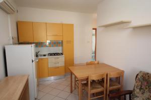 Kuchyň nebo kuchyňský kout v ubytování Residence Sole e Mare appartamenti