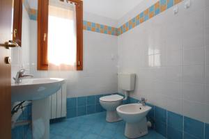 Koupelna v ubytování Residence Sole e Mare appartamenti + 26 fotografií