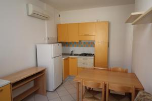 Kuchyň nebo kuchyňský kout v ubytování Residence Sole e Mare appartamenti