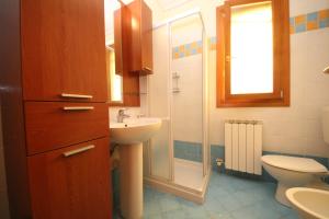Koupelna v ubytování Residence Sole e Mare appartamenti
