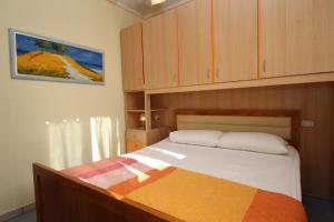 Postel nebo postele na pokoji v ubytování Residence Sole e Mare appartamenti