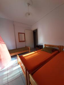 Postel nebo postele na pokoji v ubytování Savvas