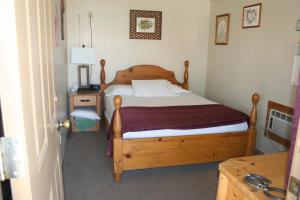 Un pat sau paturi într-o cameră la Hatch Station Bryce Canyon