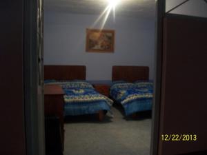 Postel nebo postele na pokoji v ubytování Hostal Eclipse Oaxaca
