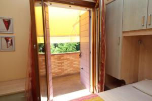 Postel nebo postele na pokoji v ubytování Residence Sole e Mare appartamenti