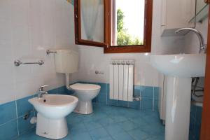 Koupelna v ubytování Residence Sole e Mare appartamenti