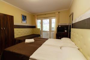 Posteľ alebo postele v izbe v ubytovaní Bella Villa