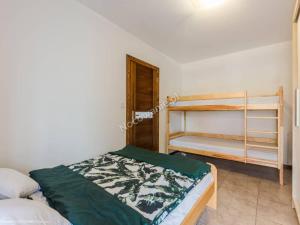 a bedroom with a bed and a bunk bed at Best in Karwia +94 photos