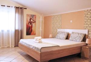 Ліжко або ліжка в номері SAPPHIRE & IVORY Luxury Apartments - Kavala