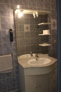 Kupaonica u objektu Hotel de Normandie