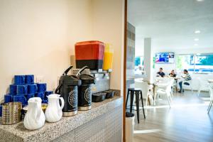 Příslušenství pro přípravu čaje a kávy v ubytování Hotel Star