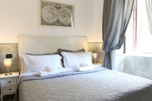 Guest House Relais Indipendenza客房内的一张或多张床位