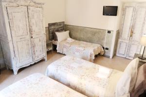 Guest House Relais Indipendenza客房内的一张或多张床位