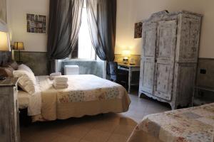 Guest House Relais Indipendenza客房内的一张或多张床位