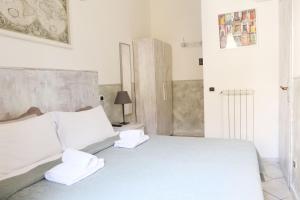 Guest House Relais Indipendenza客房内的一张或多张床位