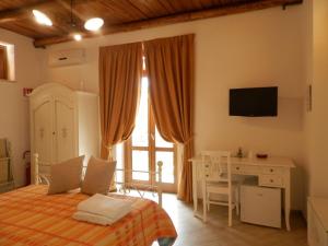 Postel nebo postele na pokoji v ubytování Agriturismo Orrido di Pino