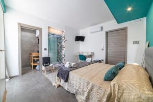 Rúm í herbergi á Albergo Piazza Risorgimento