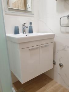 Koupelna v ubytování Guesthouse Dominović