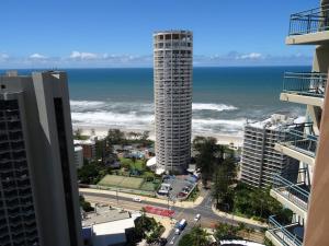 a view of the beach from the balcony of a building at Crown Towers in Gold Coast
