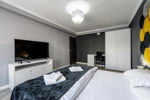 Giường trong phòng chung tại Feeling Home Apartment +17 ảnh