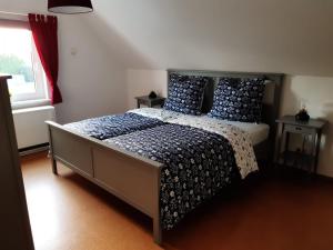 Кровать или кровати в номере Ferienhaus Isaro
