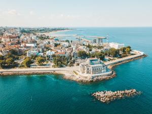 an aerial view of a city on the water at Unique Old Town Home 2min to Beach and Harbour Private Entrance in Constanţa