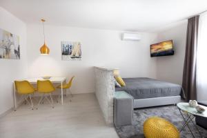 Posezení v ubytování Trend Apartmanház -Vizslás