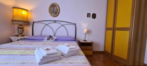 Postel nebo postele na pokoji v ubytování B&B Isonzo