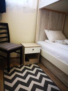 Postel nebo postele na pokoji v ubytování Apartments&Camping ZIP