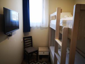 Postel nebo postele na pokoji v ubytování Apartments&Camping ZIP