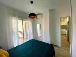 Postel nebo postele na pokoji v ubytování Santa Bárbara by Albir Proper Properties