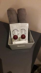a box with two balls in it on a table at Balmoral Skye in Portree