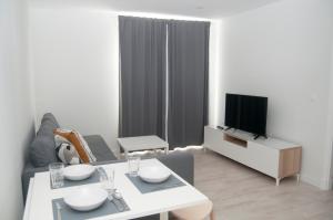 Telewizja i/lub zestaw kina domowego w obiekcie El mirador de Ancha