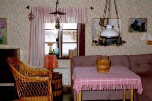 Posezení v ubytování Romantiskt hus Stina