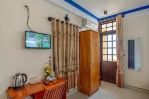 TV a/nebo společenská místnost v ubytování Sau My Homestay + 37 fotografií