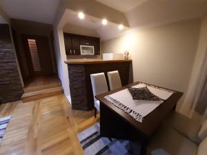 Postel nebo postele na pokoji v ubytování Apartman Sunčana dolina, Zaovine