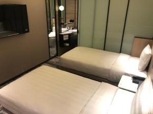 德立庄酒店客房内的一张或多张床位