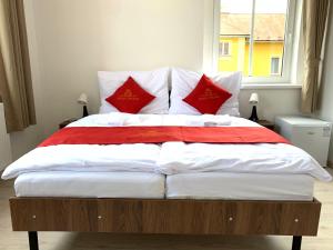 Letto o letti in una camera di Pension VIDHOUS 1