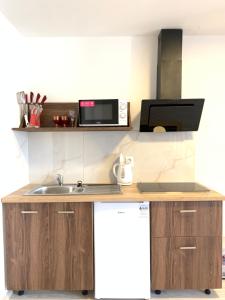 Cucina o angolo cottura di Pension VIDHOUS 1