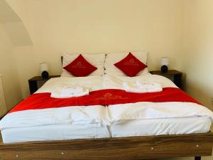 Letto o letti in una camera di Pension VIDHOUS 1