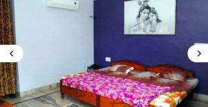 A bed or beds in a room at Hill View