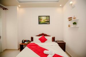 Letto o letti in una camera di Conico Đà Lạt Hotel